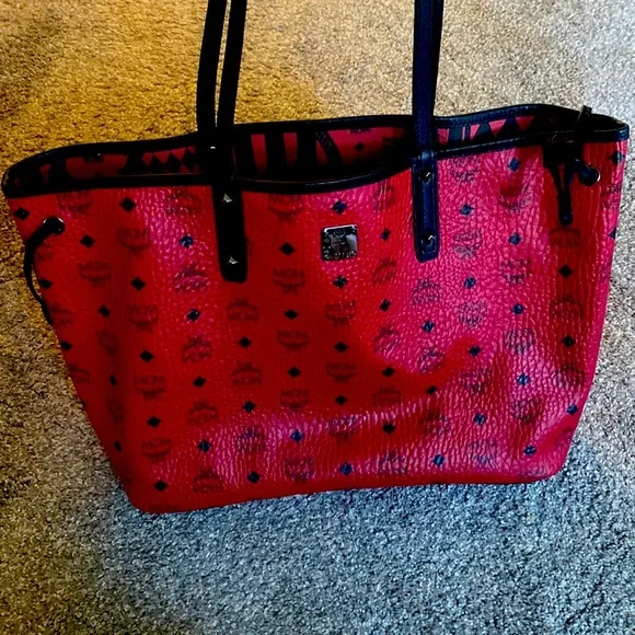 Red and black mcm purse sales